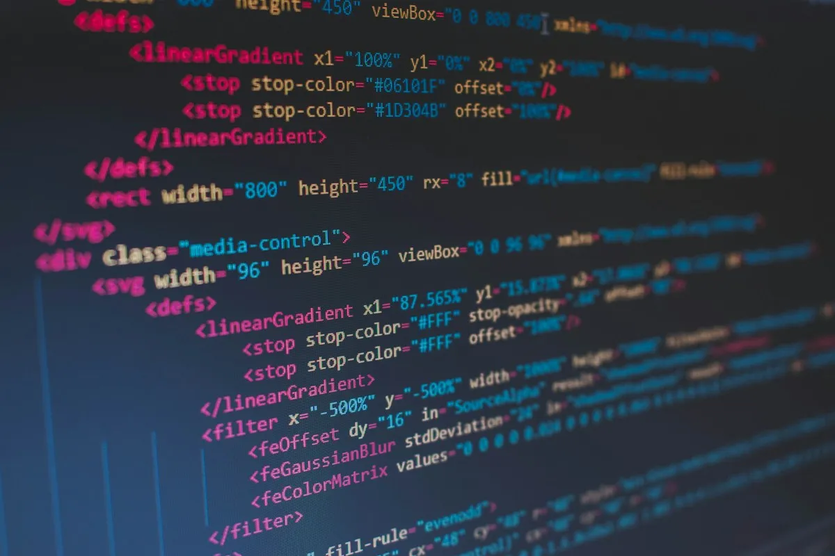 Code on a screen with a dark theme